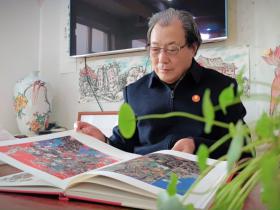 丹青“榴”韵——访著名画家石榴大使周长胜